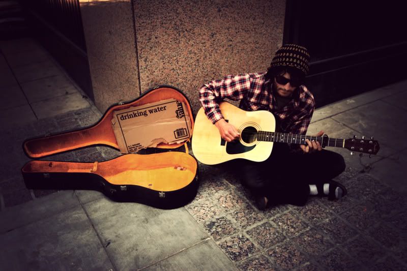 IMAGE: http://i127.photobucket.com/albums/p124/chrisa13/guitarguyvintage.jpg