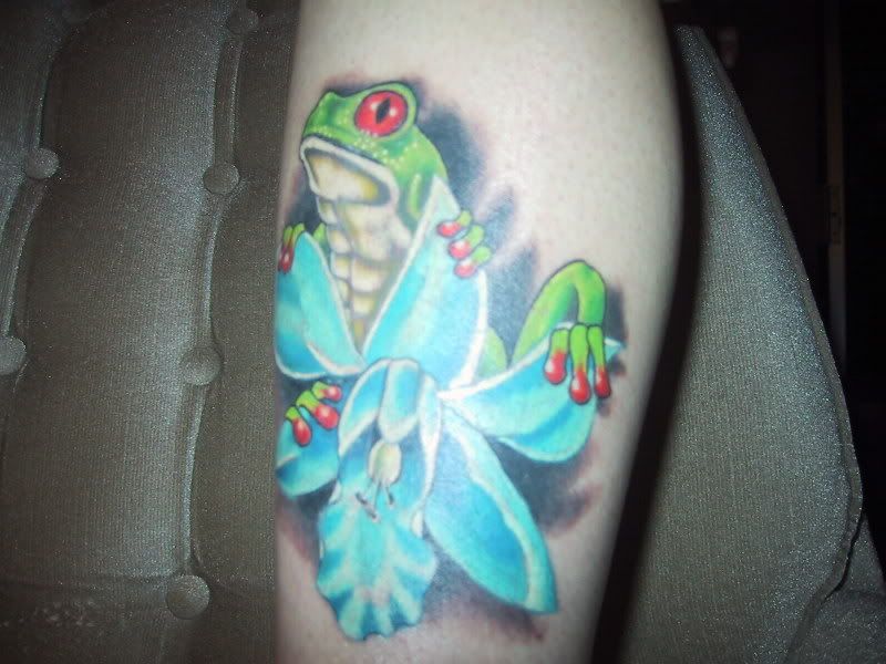 orchid flower tattoo. frog and blue orchid flower