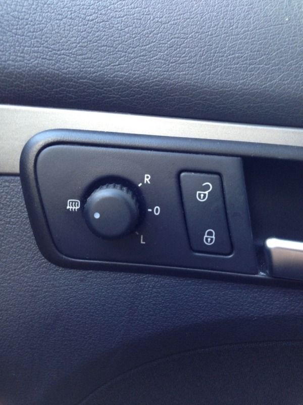 How do you turn on the heated mirrors??